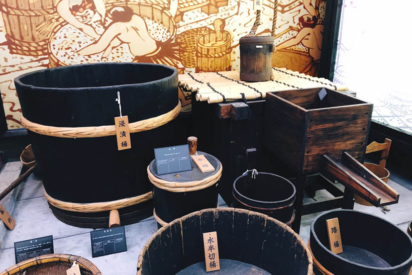 Traditional sake-making tools at the Gekkeikan Okura Sake Museum in Kyoto, Japan.