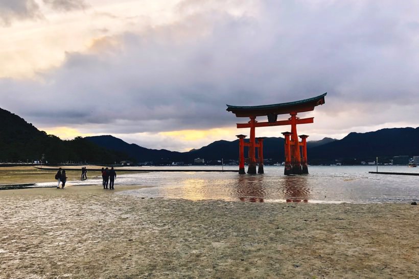 The Great Torii, just as the sun was setting and the water was receding.
