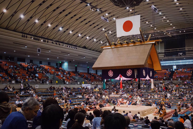 Sumo wrestlers in action at the Edion Arena in Osaka.