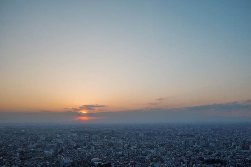 The sun setting over Tokyo, as seen from one of the Metropolitan Office buildings.
