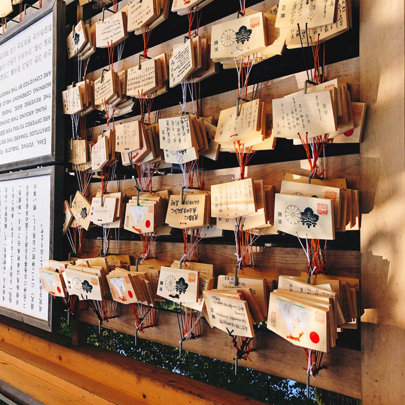 Wishes written on pieces of wood (called 'Ema') which are attached to designated walls at the Meji shrine in Tokyo, Japan.