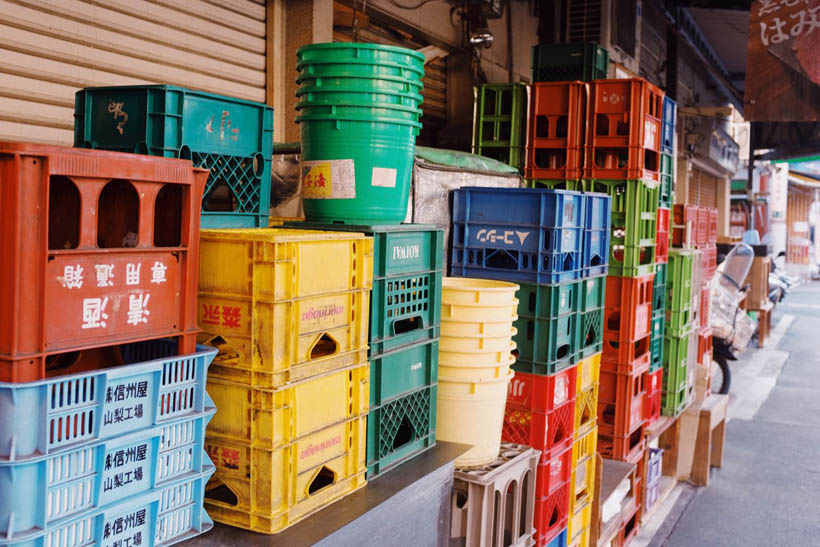 Coloured boxes and containers in the Tsukiji Fish Market region in Tokyo.