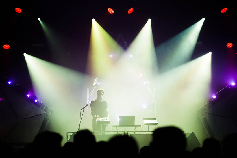 Fakear, surrounded by lights, performing at Les Nuits Botanique in 2015.